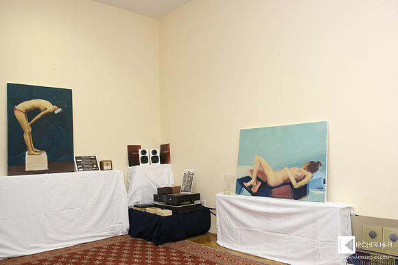 To make the room more beautiful, I could use pictures of a regional artist.