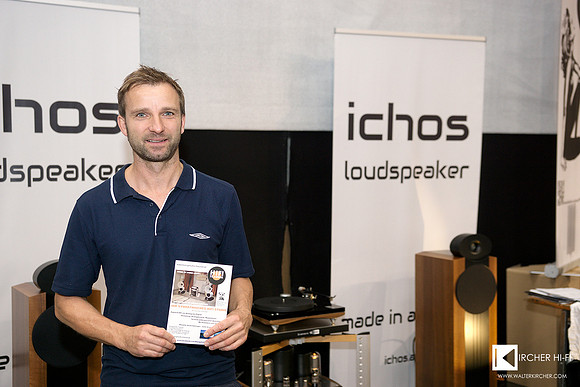 Wolfram Trauner in front of his booth in Linz