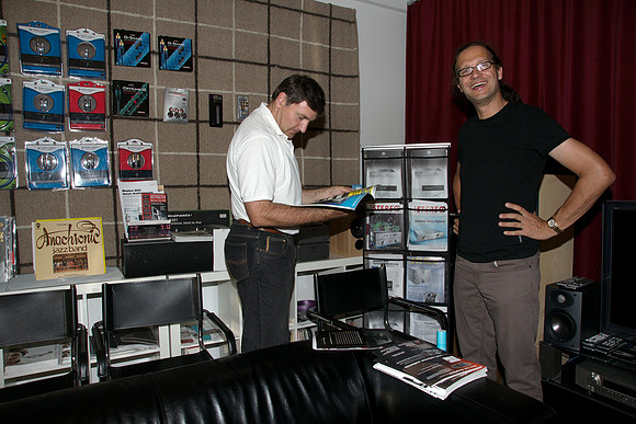 DI Georg Ruppert with visitor in his Pure Dynamcis shop in Graz, Austria