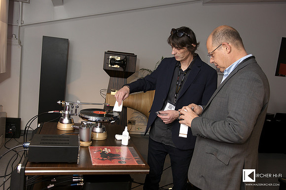 Sasa Kocic (Trafomatic Audio) and Manolis Proestakis (Tune Audio) cleaning a record with Chisto Easy Groove spray & wipe
