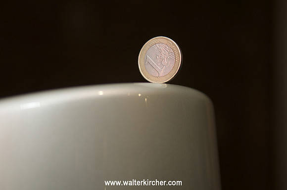 KEF Blade loudspeaker detail with coin on top